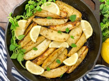 Greek-Style Lemon Potatoes on a skillet