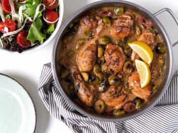 This dish takes the traditional coq au vin to new heights by infusing it with the crispiness of dry white wine and the smoky richness of sausage, all perfectly complemented by the earthy tones of Brussels sprouts.