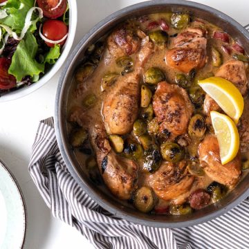 This dish takes the traditional coq au vin to new heights by infusing it with the crispiness of dry white wine and the smoky richness of sausage, all perfectly complemented by the earthy tones of Brussels sprouts. 