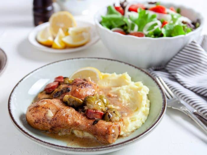 This dish takes the traditional coq au vin to new heights by infusing it with the crispiness of dry white wine and the smoky richness of sausage, all perfectly complemented by the earthy tones of Brussels sprouts. 