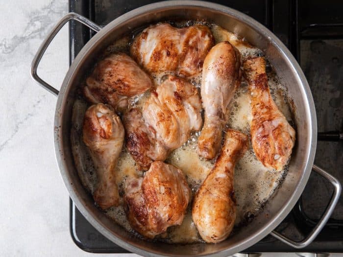 Add the chicken pieces and cook, turning occasionally until all sides have browned.