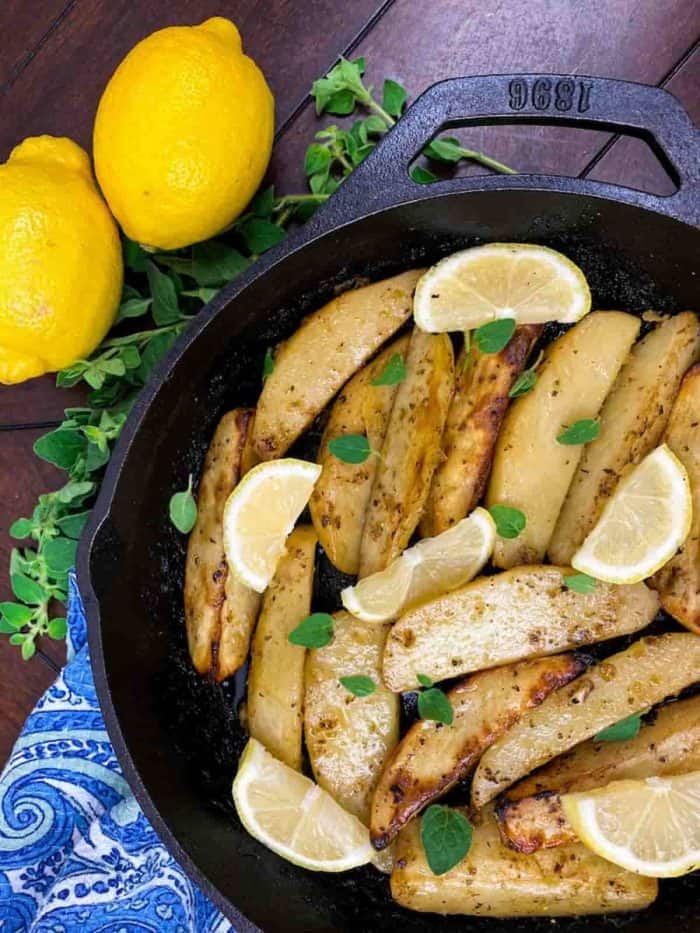 perfectly crispy potato wedge, subtly infused with the zest of fresh lemon and the warmth of a myriad of Mediterranean spices with real lemon on the sides