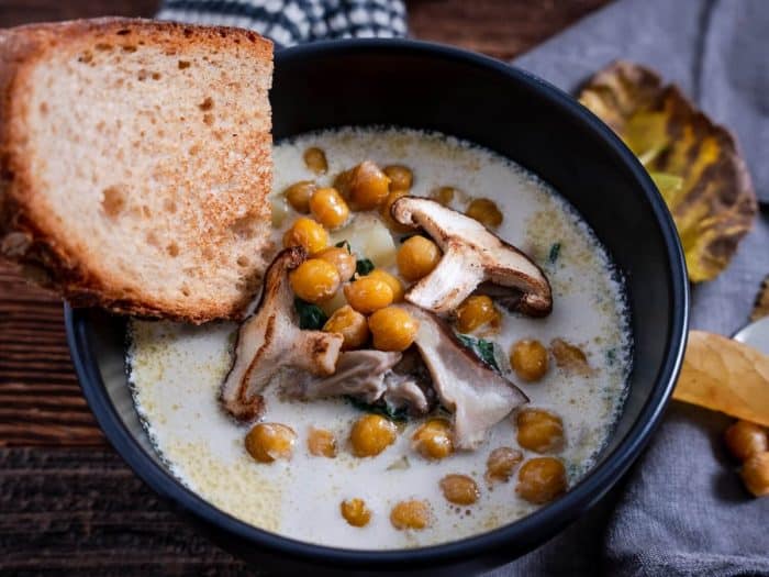 earthy taste of mushrooms, the smoothness of potatoes, and the tender bite of spinach, all crowned with a crispy chickpea topping. Plus, the chickpeas are the crunchy croutons