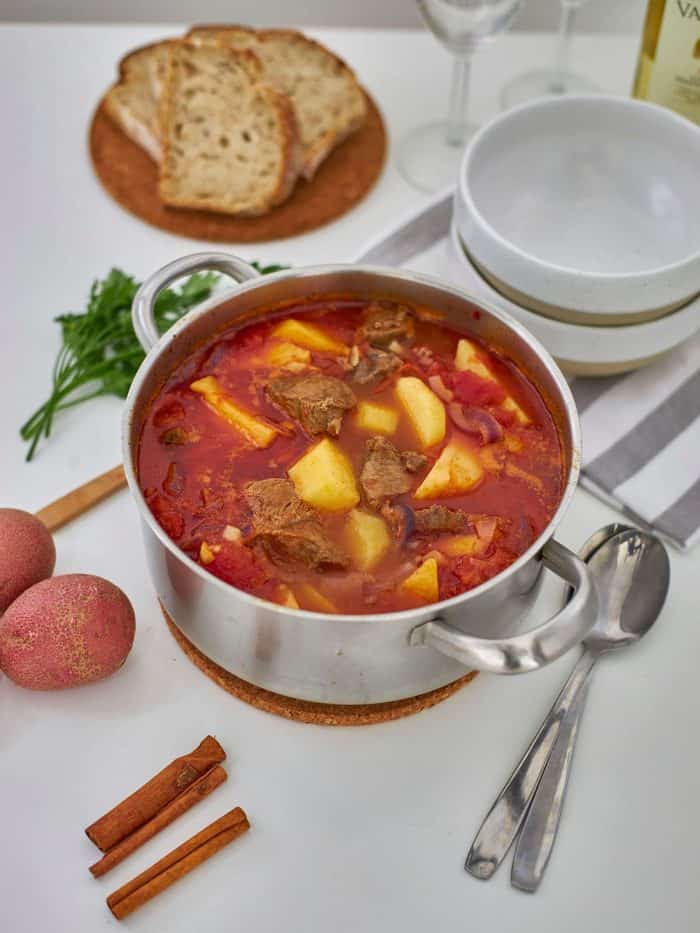 Bring to a low boil and simmer uncovered until the beef and potatoes are tender.