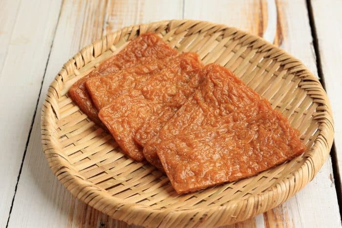 a plate of Aburaage, or thinly sliced fried tofu