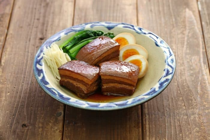 Pork belly, referred to as kakuni, features prominently in ramen as a juicy and rich topping