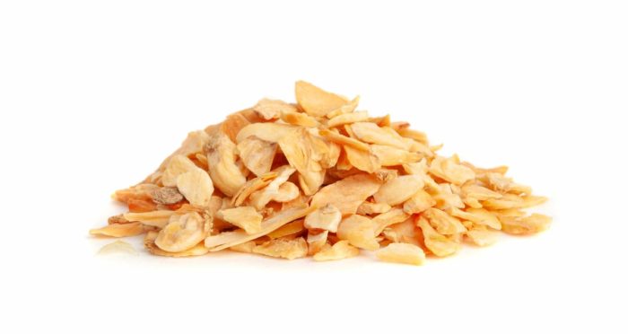 Dry Garlic Slices Isolated, Crispy Fried Cloves Pile Closeup