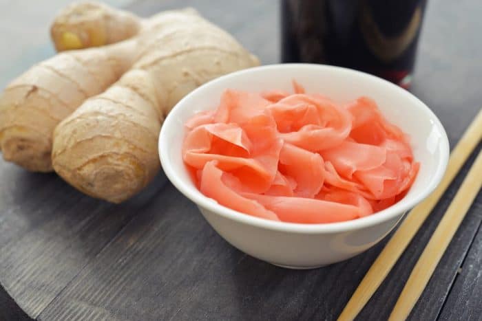 Often known in Japanese as gari, pickled ginger isn't just for sushi. Its sharp, refreshing taste cleanses the palate and adds a vibrant contrast to your soup. Finely chop or lay thin slices atop your ramen for a burst of tanginess.