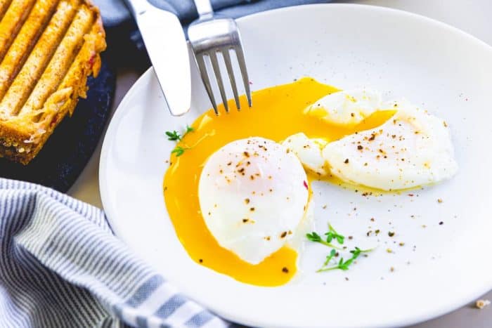 While soft-boiled eggs are standard, try a poached egg for a delicate, sophisticated touch. The runny yolk enriches the broth, adding a silkiness that balances with the other textures and flavors in your bowl.