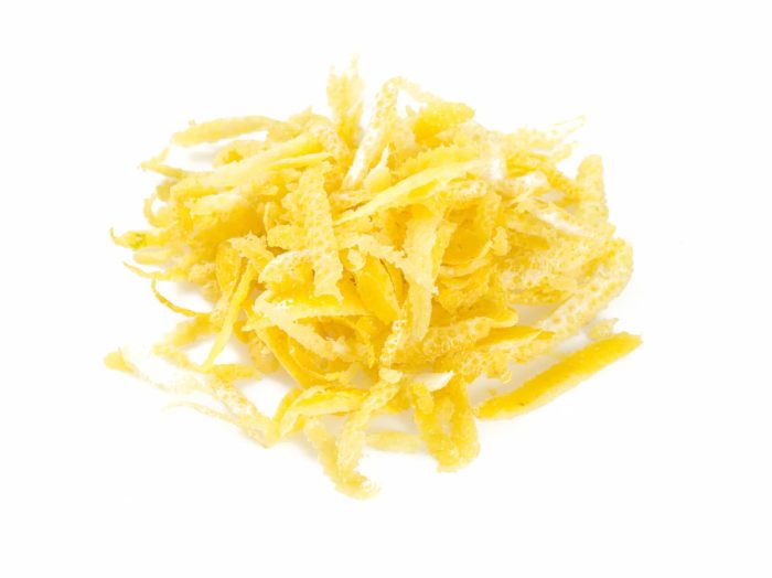 Lemon zest isolated on white