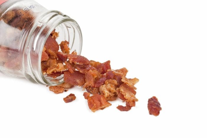 A bottle with bacon bits