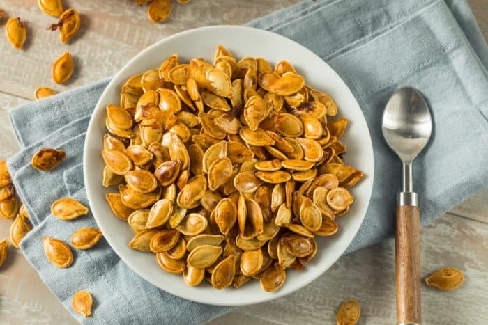 a plate of Homemade Roasted Spiced Pumpkin Seeds