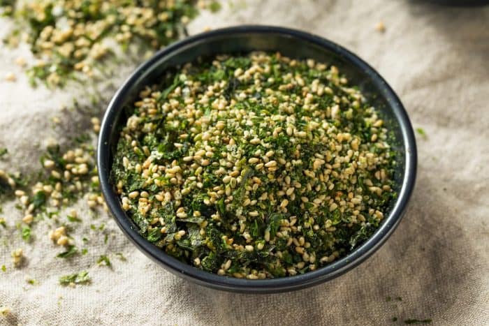 a small black bowl full of Dry Organic Japanese Furikake Rice Seasoning