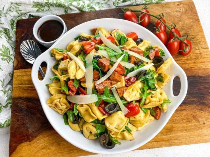 Introducing the tortellini antipasto salad, a scrumptious medley that's sure to tantalize your taste buds. Imagine tender tortellini mingling with the spicy kick of pepper jack cheese, all dressed in a tangy balsamic vinaigrette. 