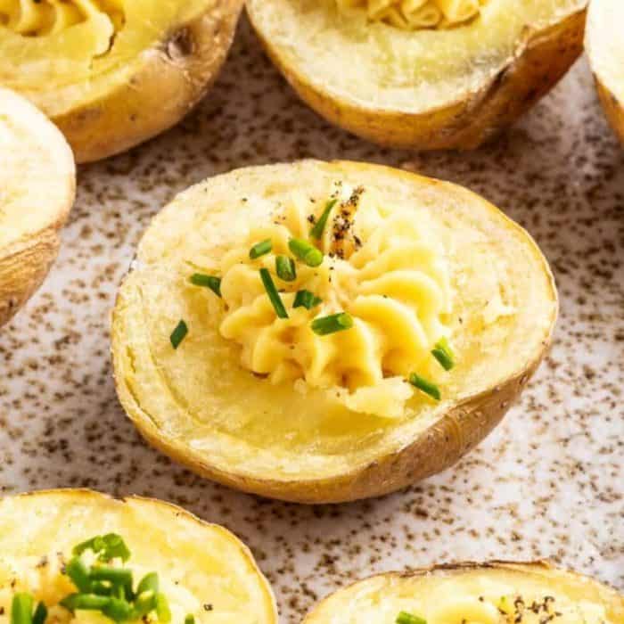 These bite-sized delights are filled with a savory mix of vegan mayonnaise and Dijon mustard, topped with paprika for a pop of color and flavor.