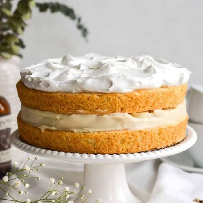 The vegan banana cream pie cake merges two beloved desserts into one. Imagine layers of moist banana cake paired with a luscious banana cream filling, all enrobed in a velvety whipped topping.