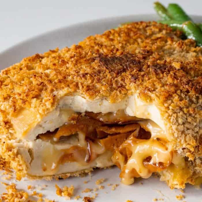 Crispy breading encases a tender, savory filling of plant-based ham and melty vegan cheese, creating a symphony of textures and tastes that even non-vegans will applaud.
