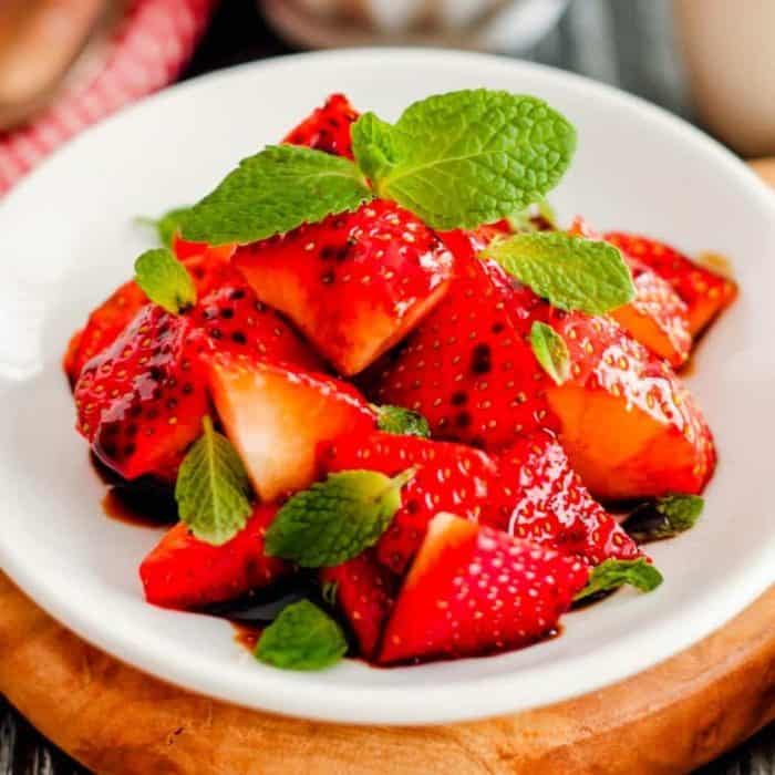 The balsamic reduction enhances the strawberries' natural juiciness, while the mint and cracked black pepper add a refreshing and unexpected kick that will intrigue and delight your palate.