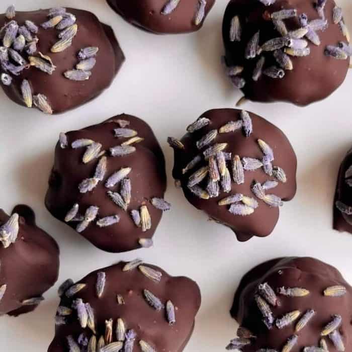These truffles are a fusion of floral and sweet, coated in a rich dark chocolate that melts in your mouth, offering a sophisticated and unique flavor profile.