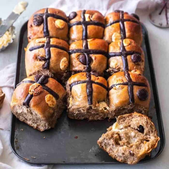 Vegan and decadent, these buns are studded with chocolate chips and spiced to perfection, a sure way to please the chocolate lovers at your Easter table.