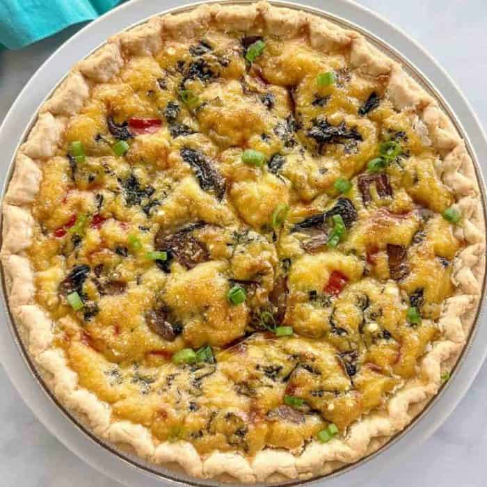 Infused with the goodness of colorful vegetables and mushrooms, this quiche is a symphony of savory notes, perfect for those seeking a cholesterol-free indulgence.