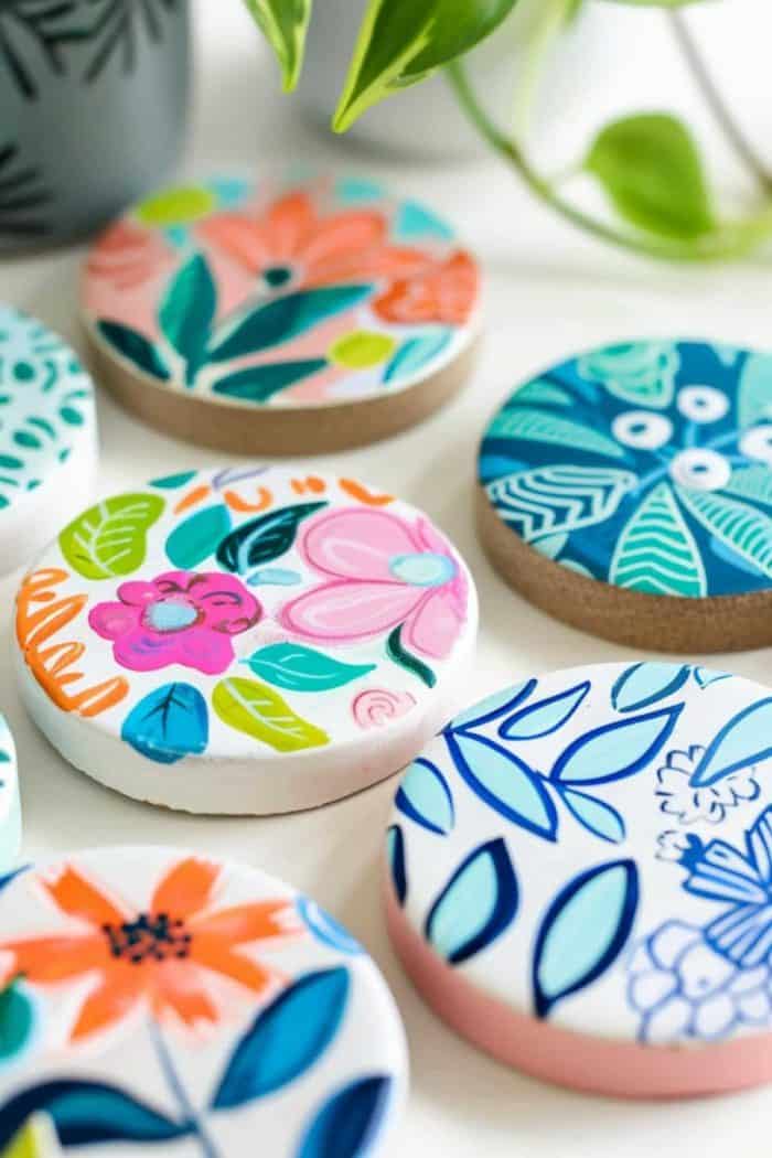 Transforming simple coasters into mini art canvases with hand-painted designs and stencils makes for a functional and artistic Mother's Day gift that’s ready to serve up style.