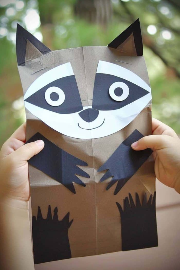 This paper bag raccoon — with its paws and dark eyes — is poised for nighttime escapades in the backyard.