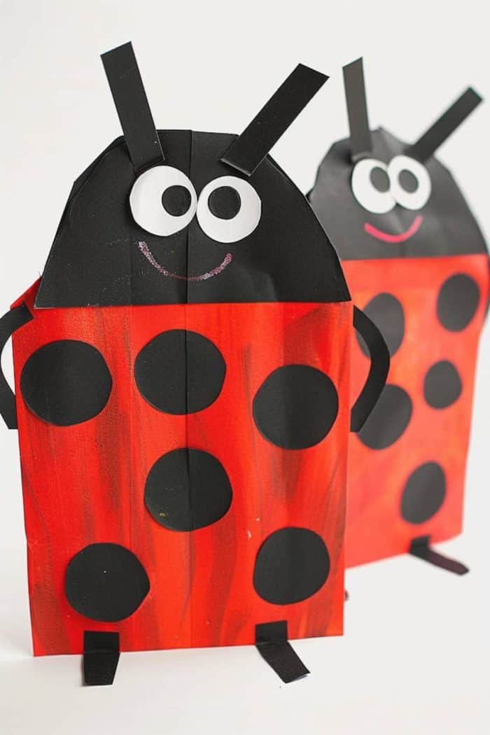 They can make ladybug crafts by painting a paper bag red and adding eyes, black spots, and black antennae with paper cutouts.