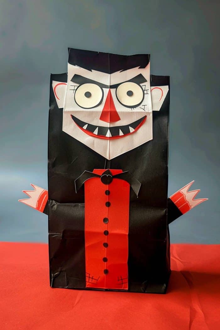 Not all crafts are fun and games. If you want to create spooky decorations for Halloween, you and your kids can create paper bag vampires with a scary face and a red suit.