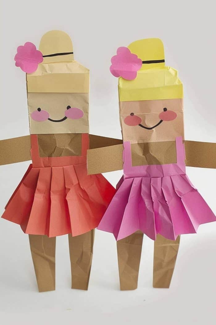 The rumpled skirts of these ballerinas add a realistic touch to their dance. Young artists can also add ballerina bun hairstyles using a different set of paper bags!