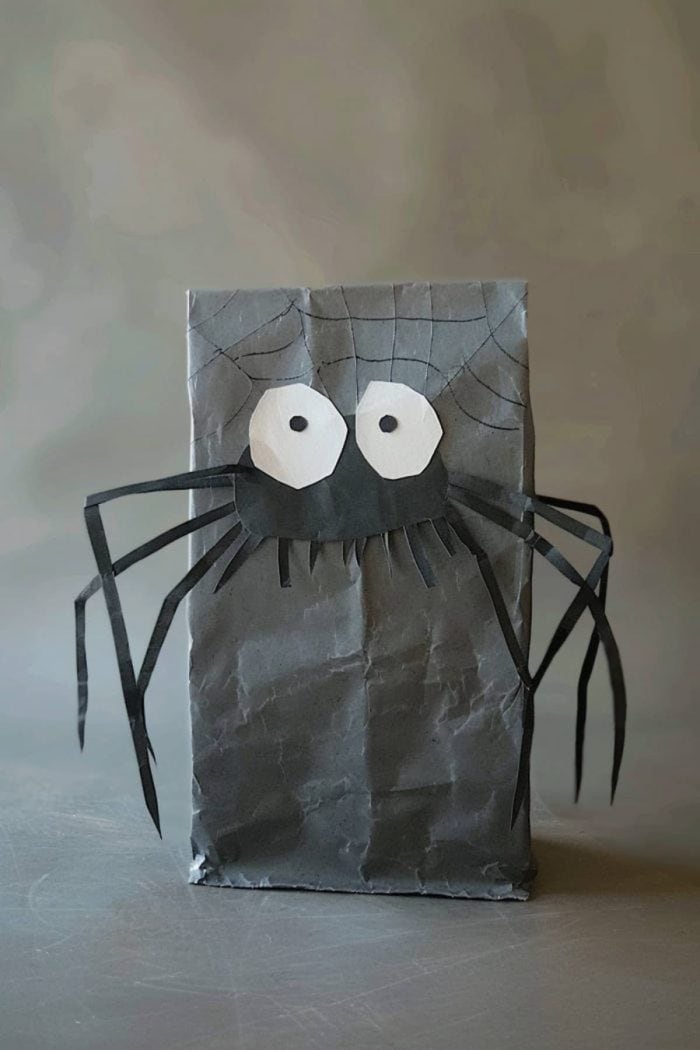 Your kids will love making this paper bag spider skitter around with its long legs, adding a creepy-crawly element to playtime!