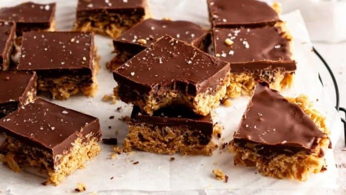 Rice Krispies with peanut butter, corn syrup, sugar, and salt topped with chocolate chips and salt