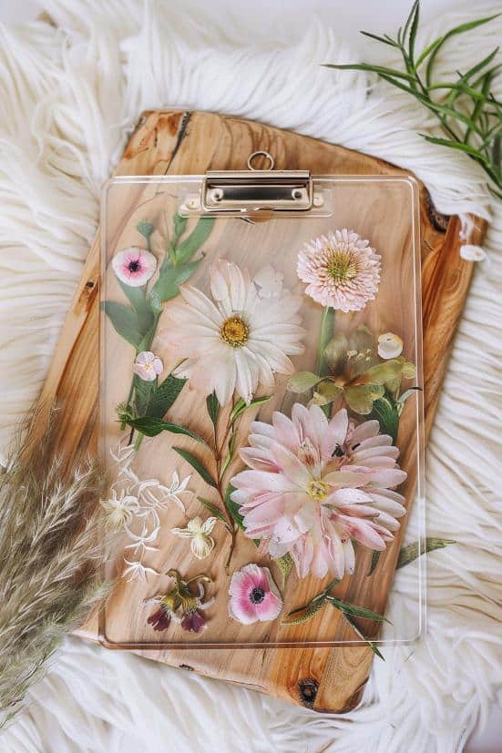 Add pressed flowers to your clipboard to bring a touch of nature's elegance to your desk.
