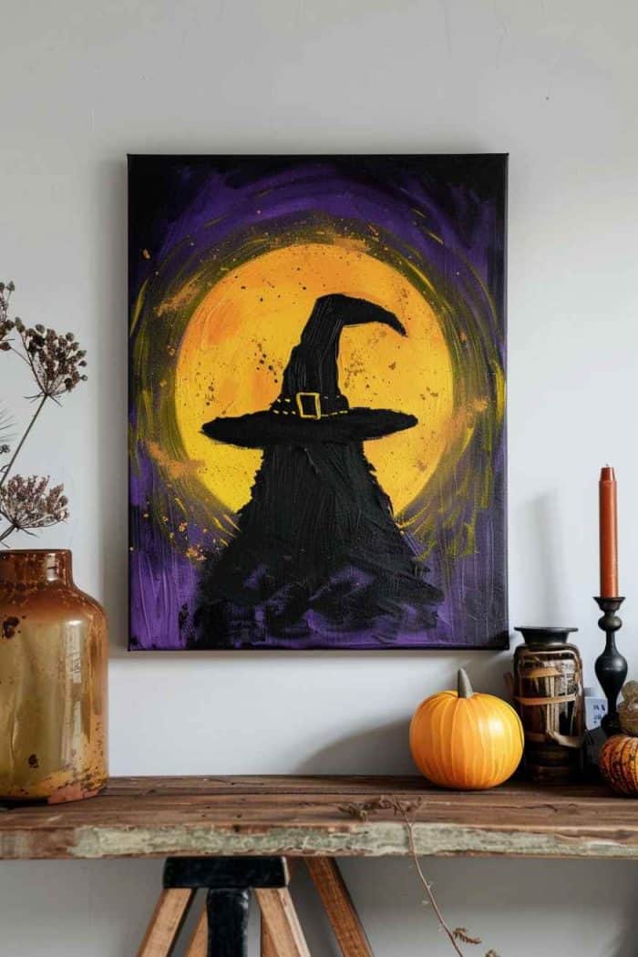 Capture the mystique of Halloween night by painting a witch's hat silhouetted against a glowing full moon. Opt for deep purple for the background and black to create the witch’s hat and head. Great for setting a spooky, magical tone!