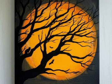 There’s a sinister feel to the quiet beauty of Halloween night, and you can portray this hair-raising feeling by painting a spooky tree with twisted branches against the dark sky with a full yellow moon. 