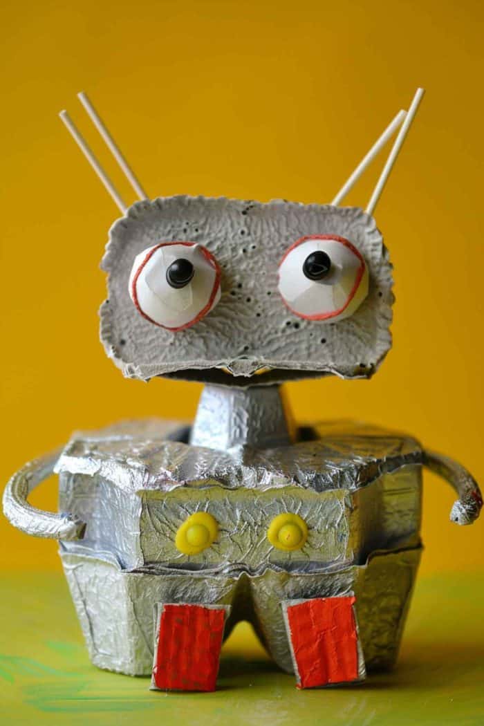 Assemble a robot’s legs from egg carton cups, wrapping them in foil or silver paper and attaching them to form heads and bodies. 