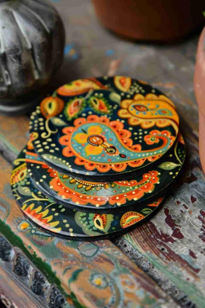 Decorate coasters with the timeless beauty of paisley patterns. Their teardrop shapes and intricate details add a classic sophistication.