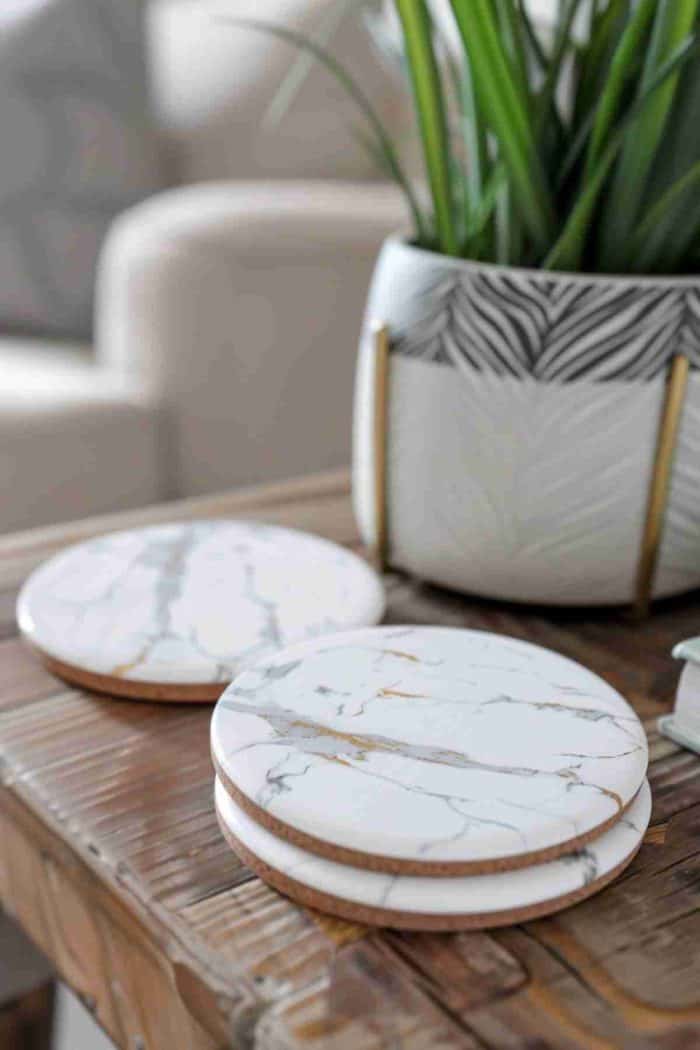 Mimic the luxurious appearance of marble on coasters, complete with painted veins for a realistic effect.
