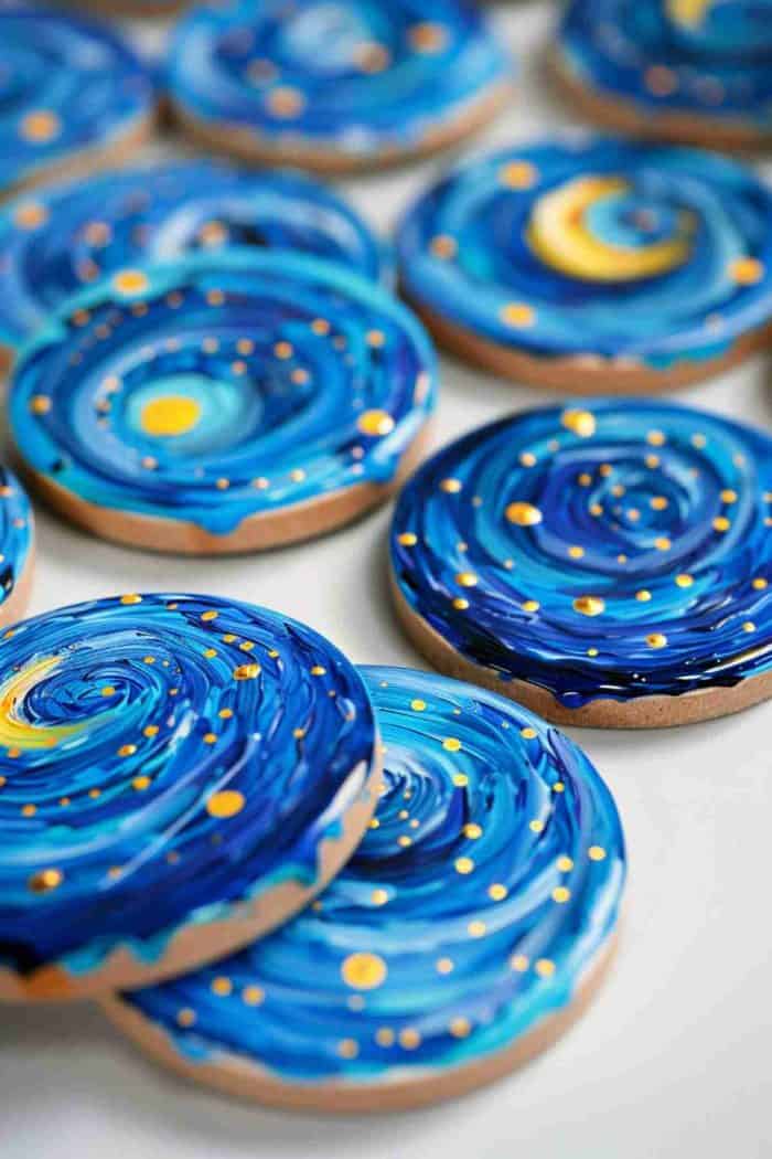 Recreate the essence of Van Gogh's Starry Night with swirling blues and dotted stars on coasters. This cosmic design brings a touch of the night sky's mystery to your living space.