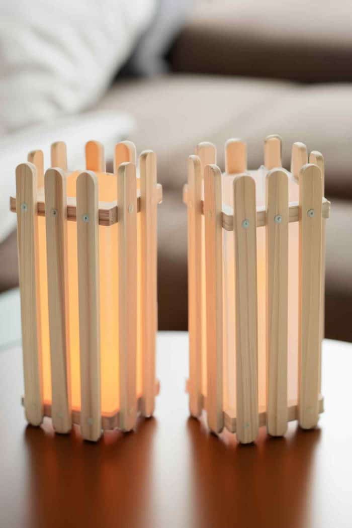 Craft quaint lanterns with popsicle sticks and translucent paper. Form a square or rectangular frame with the sticks and glue the paper around the sides to create the lantern walls. 