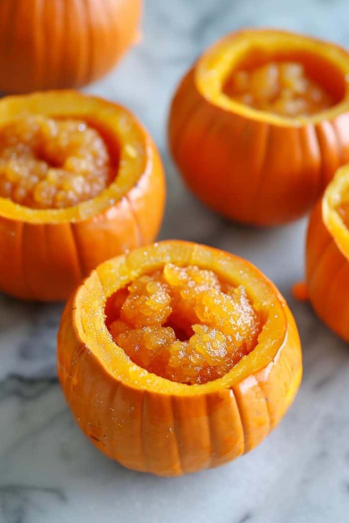 Fill hollowed-out mini pumpkins with homemade pumpkin puree for an edible craft.
