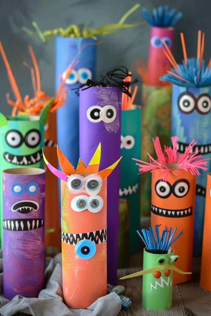 Cover paper towel rolls in colorful paper or paint to create monsters. For a whimsical effect, affix multiple sizes of googly eyes, and use paper strips or ribbons for wild hair and limbs. 