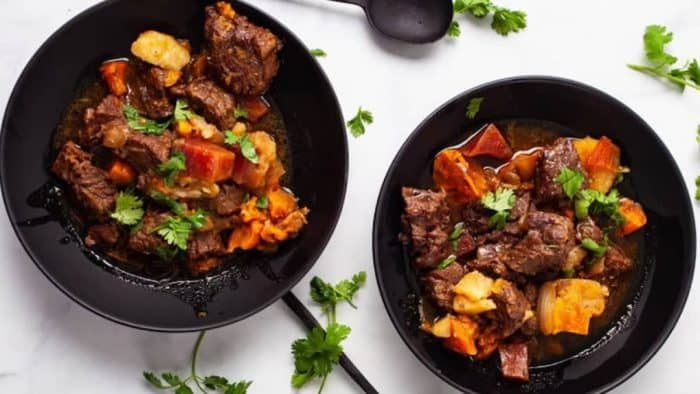This beef stew is the epitome of comfort food, where chunks of beef are pressure-cooked to tender perfection alongside russet potatoes, sweet potatoes, and beats. 