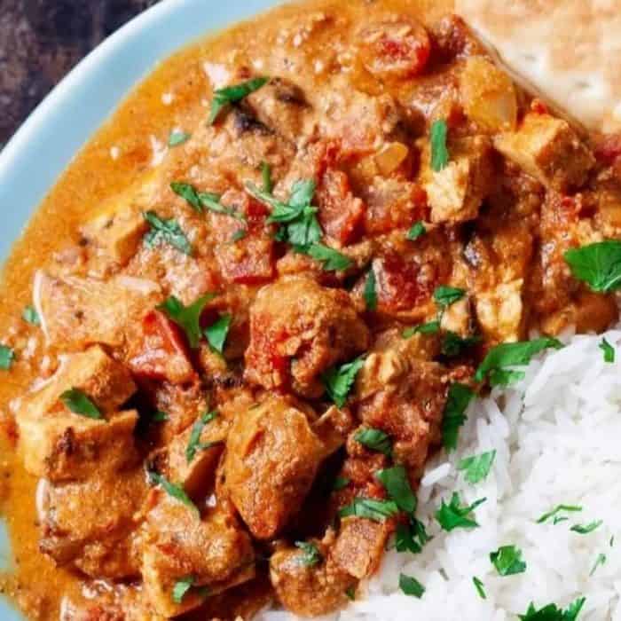 Broiled chicken chunks in a luscious tomato sauce make this chicken tikka masala recipe a mouthwatering indulgence. 
