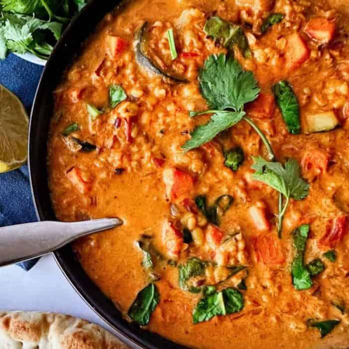 Rustic yet refined, this split mung bean curry offers a hearty, protein-packed punch, with mung beans simmered with sweet potato and zucchini in a bath of tomato purée and aromatic spices until perfectly tender. 