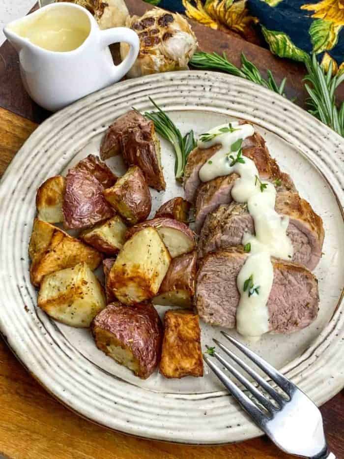 This dish, with its expertly chosen herbs and a luxuriously smooth roasted garlic sauce, offers a depth of flavor that belies its simple preparation.