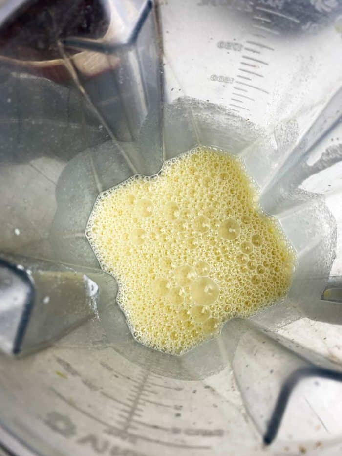 In a high-powered blender, combine eggs, milk, vanilla extract, almond extract, flour, and the rest of the white sugar. Pulse until just foamy and all ingredients are thoroughly combined