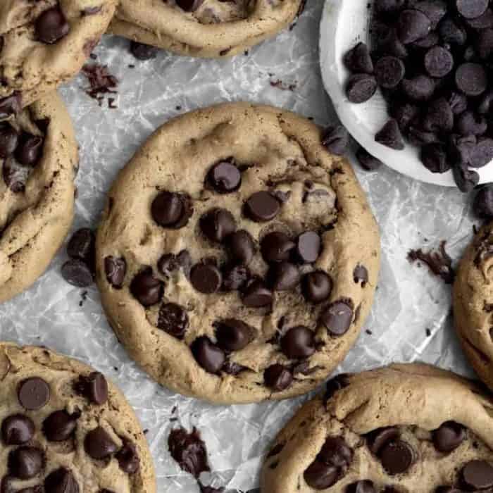 These cookies boast a golden exterior with a soft center, brimming with molten chocolate chips that provide a delightful contrast in textures.