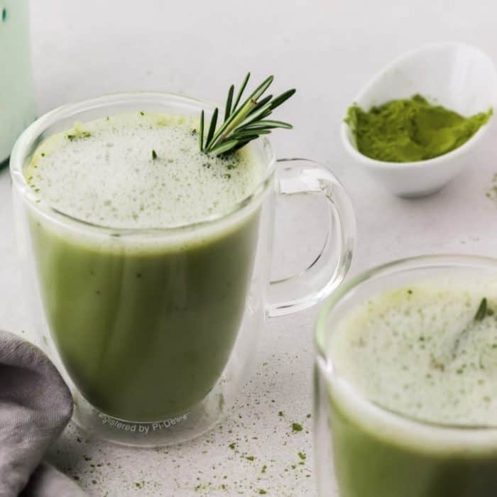To elevate your enjoyment of an almond milk matcha latte, this recipe uses a sprig of rosemary as a garnish.