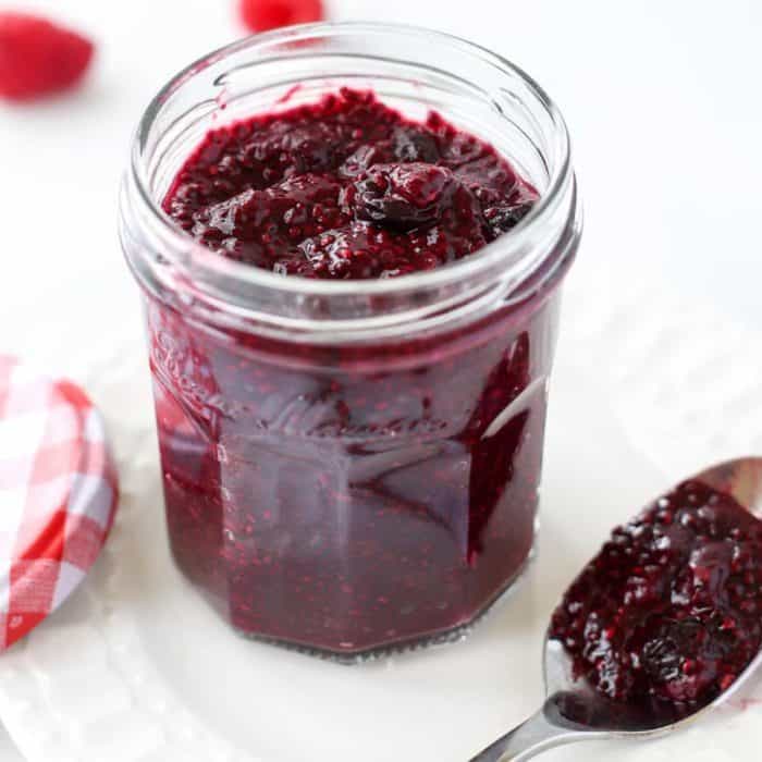 mixed berries — raspberry, blueberry, strawberry, and blackberry in a jar
